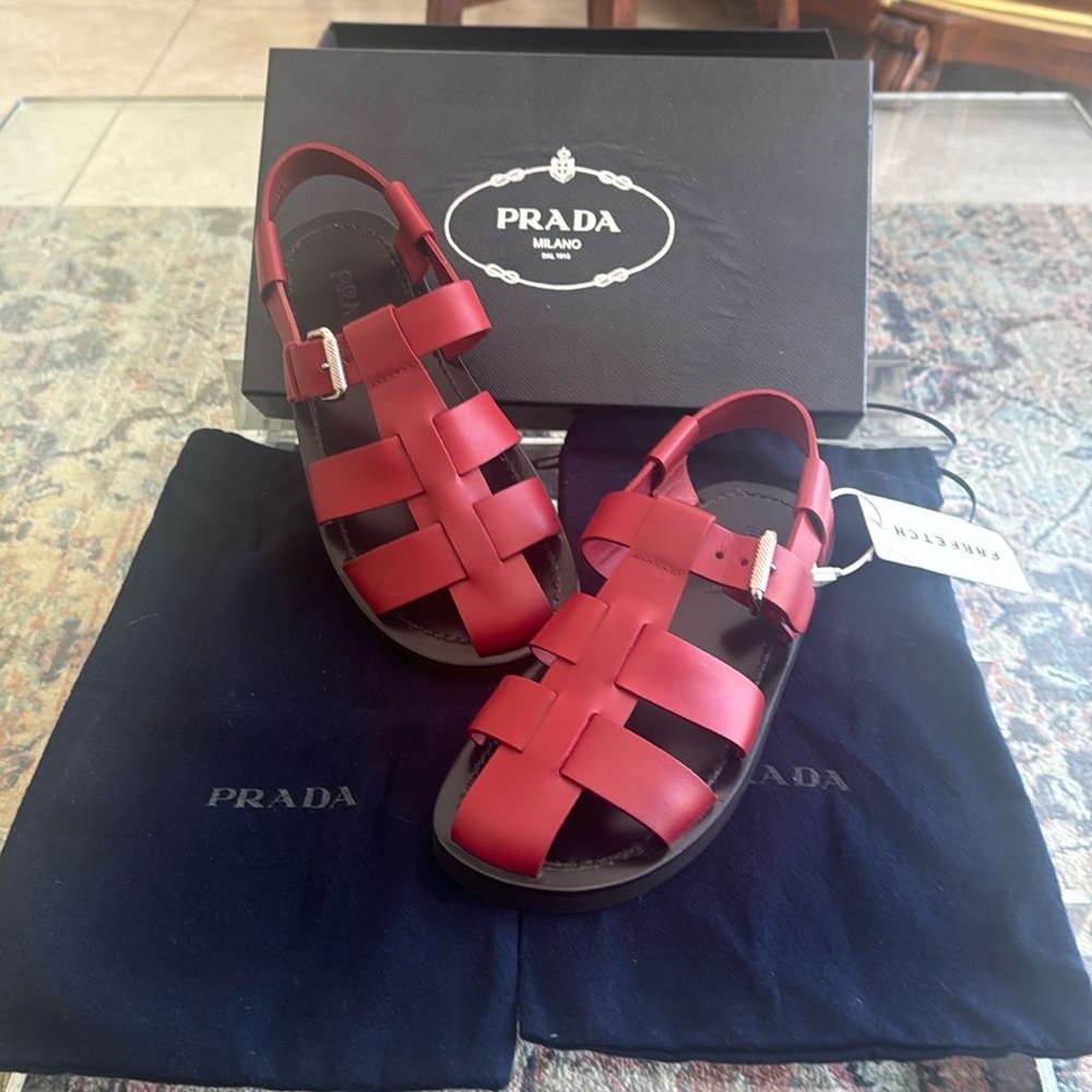 Prada New in box $650 originally. Dark Scarlet high quality leather Size8 fits10